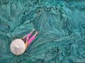 fishing nets weaver woman vietnam